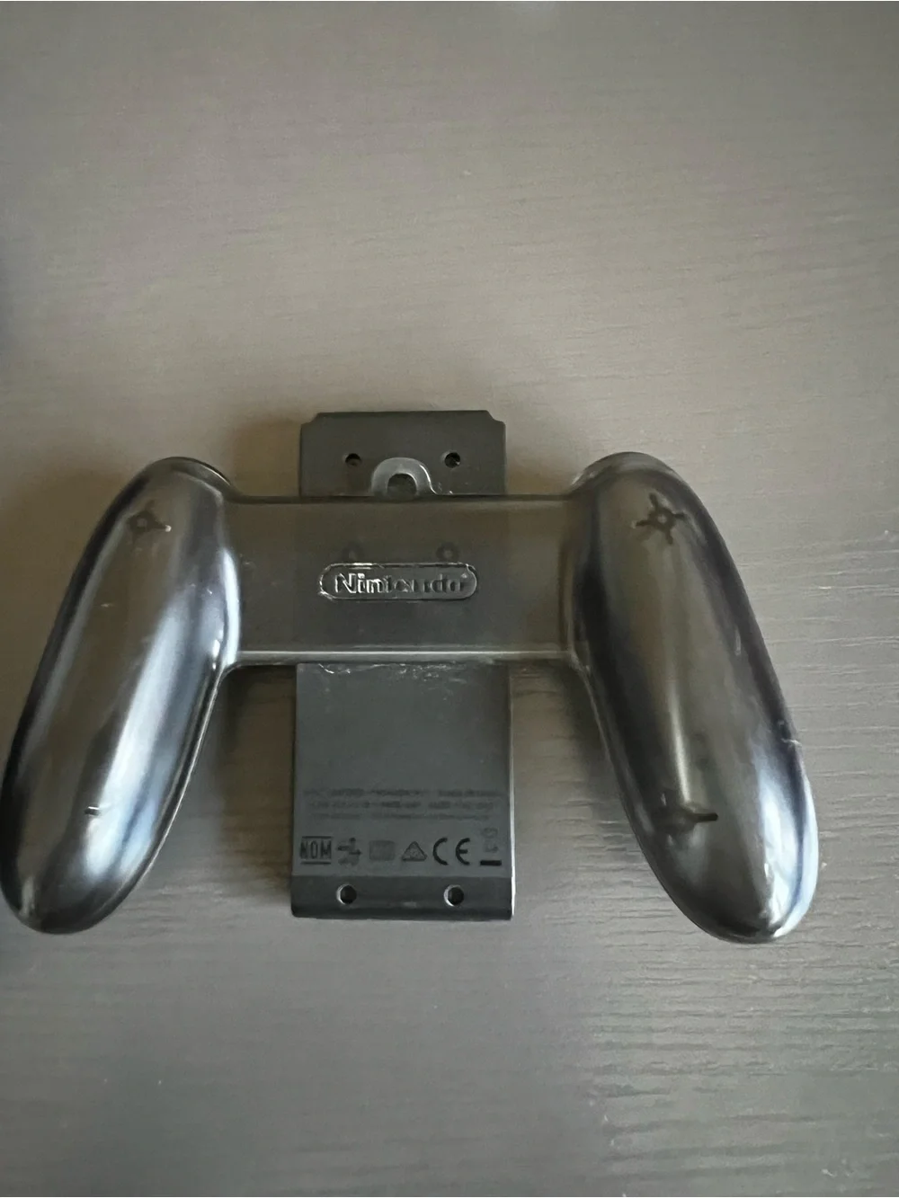 Nintendo Switch Joy-Con comfort grip and a black Joy-Con wrist strap. Used